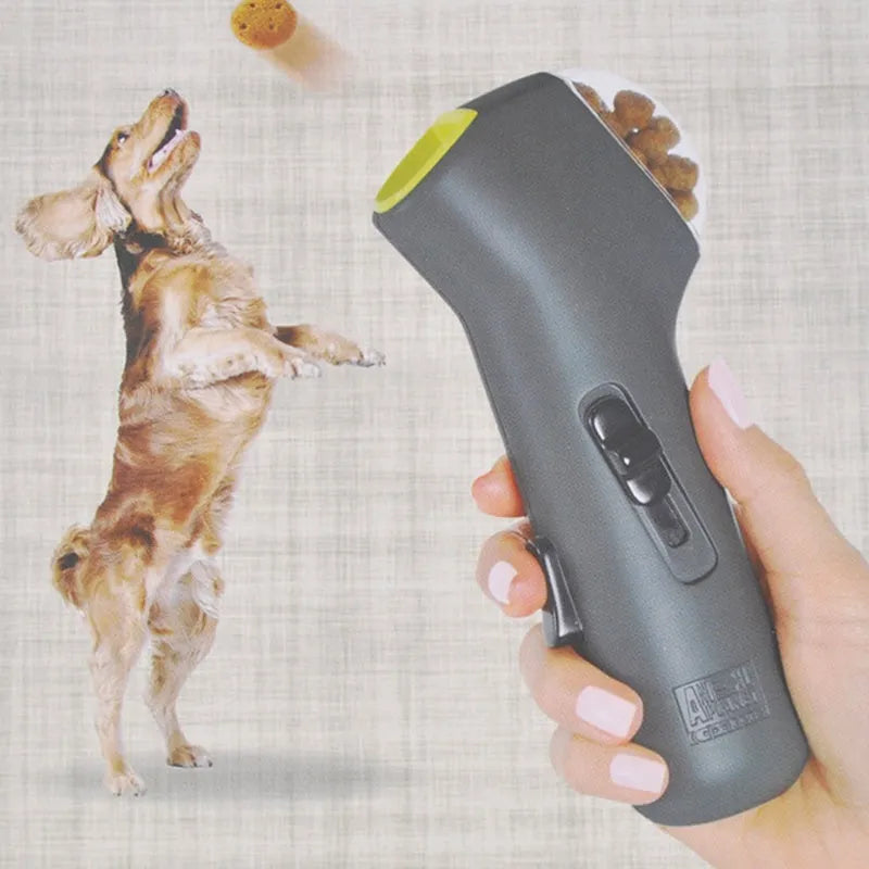 Grey plastic pet treat launcher catapult with ergonomic handle for dog and cat training