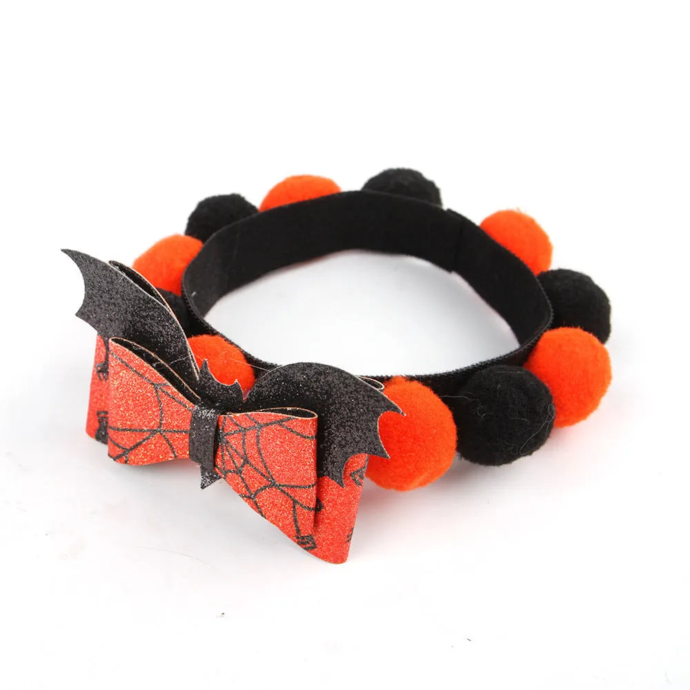 Halloween pet collar with fur ball decoration in pumpkin, skull, witch, and bow designs.