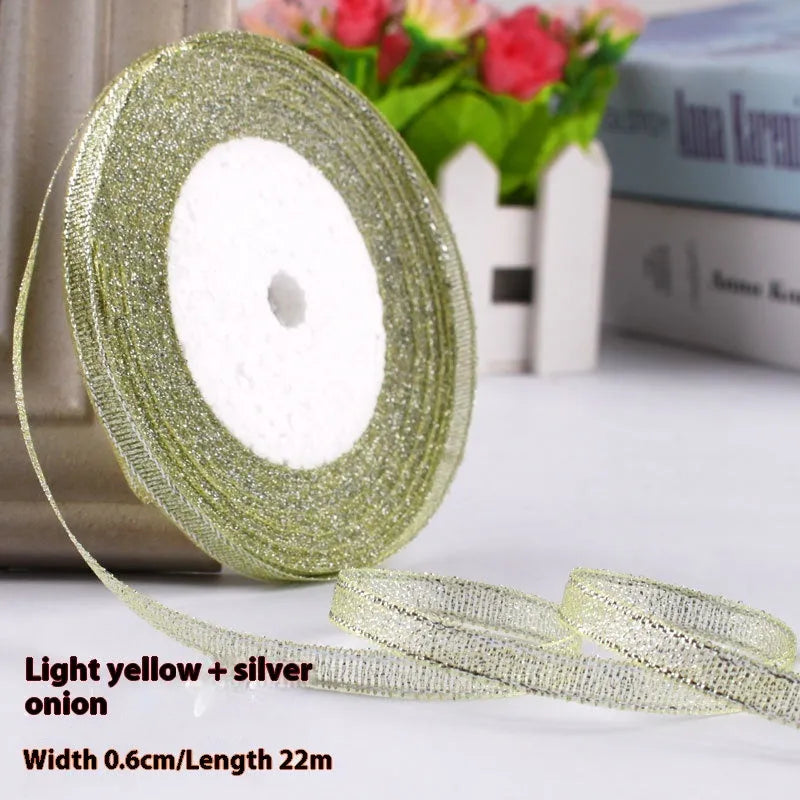 Roll of polyester gift packaging ribbon with 0.6cm width and 22 metre length in various colour options