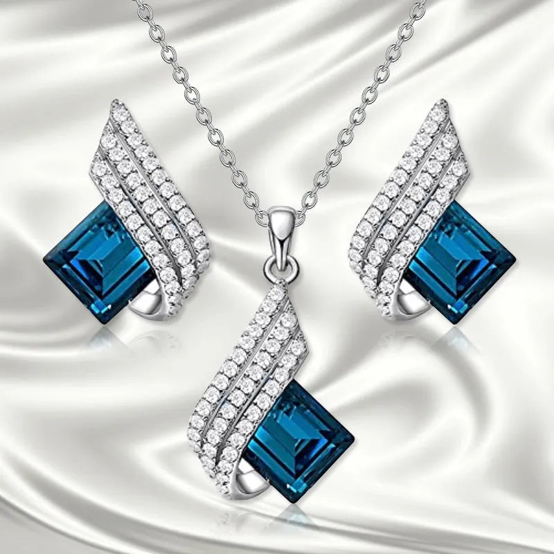 Women's necklace and earring set with cross chain design in alloy and glass with electroplated finish