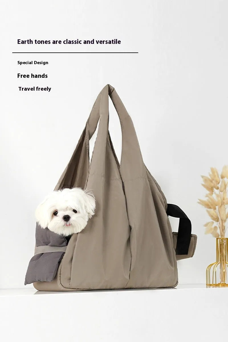 Apricot coloured cloth pet carrier handbag for small dogs and cats, shown with dimensions 41cm by 16cm by 28cm.