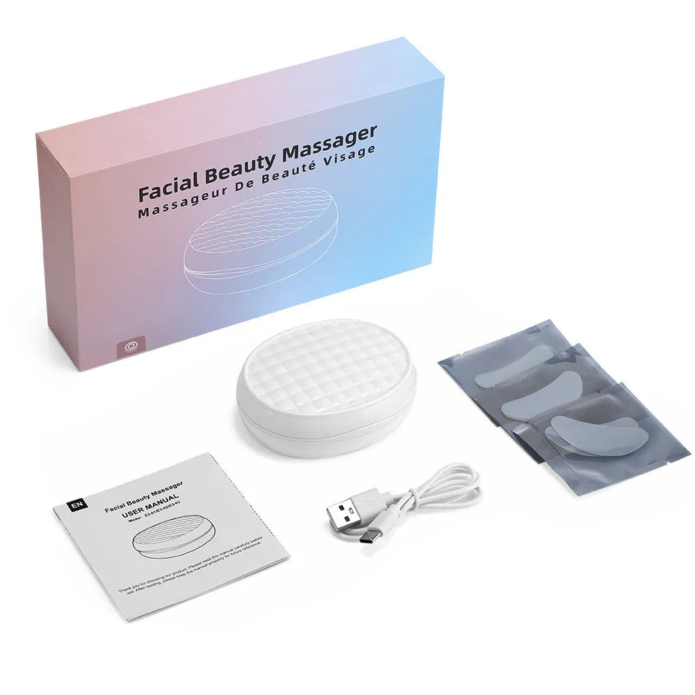 White wireless red light eye and facial massager with EMS technology for at-home skincare