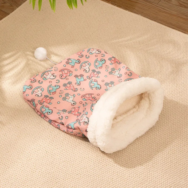 Enclosed cat sleeping bag nest measuring 50x40cm with flannel lining in blue rabbit design