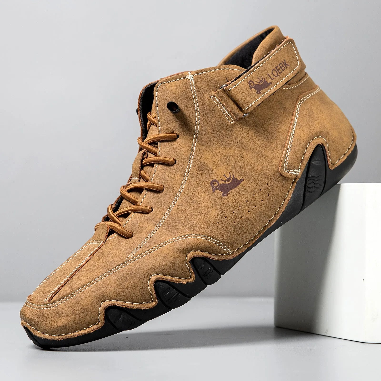 Men's brown octopus-design high-top Martin boots with rubber sole and sewn accents.