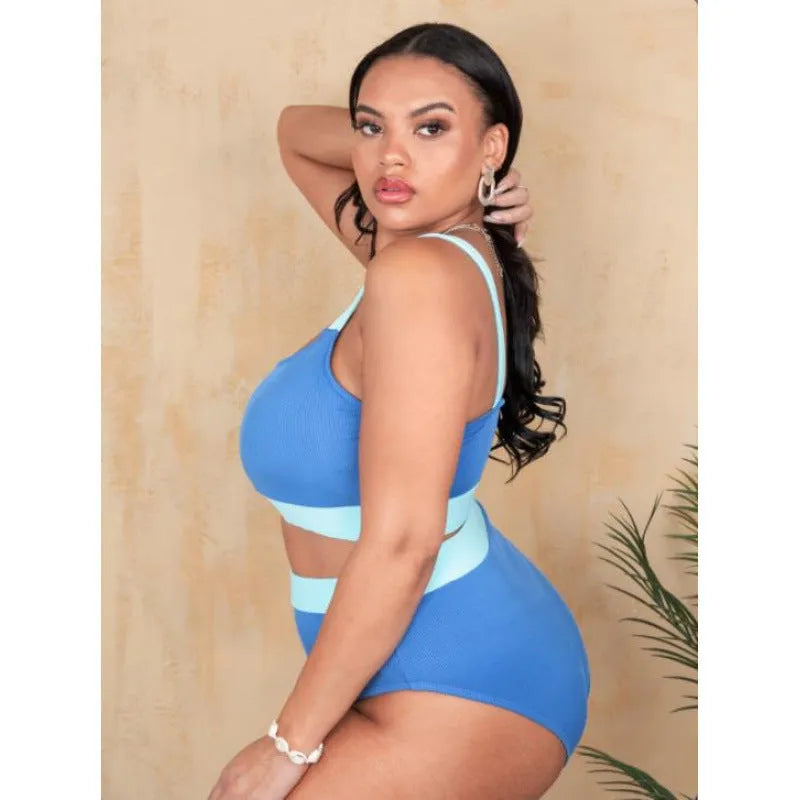 Women's solid colour bikini set with high-waist briefs and a split-leg swimsuit top.