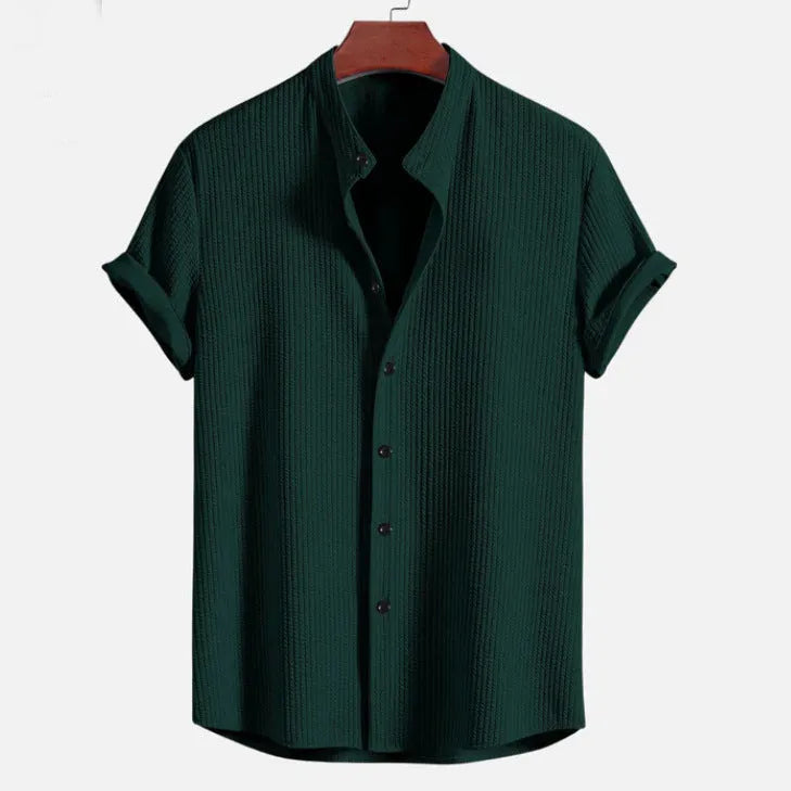 Men's loose short sleeve summer shirt in multiple colours on a hanger.