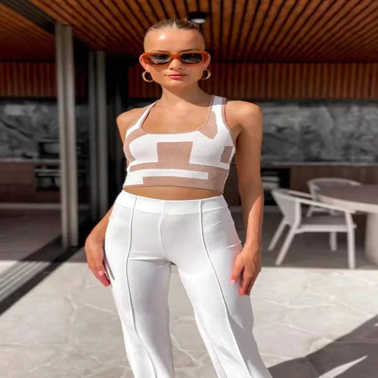 Women's U-collar camisole top in core-spun polyester fabric, shown in slim fit with exposed navel style.