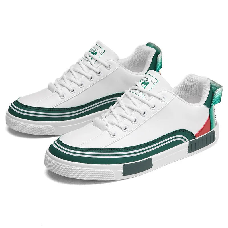 Men's white and green canvas casual shoes with visible mesh panel sections on a flat heel.