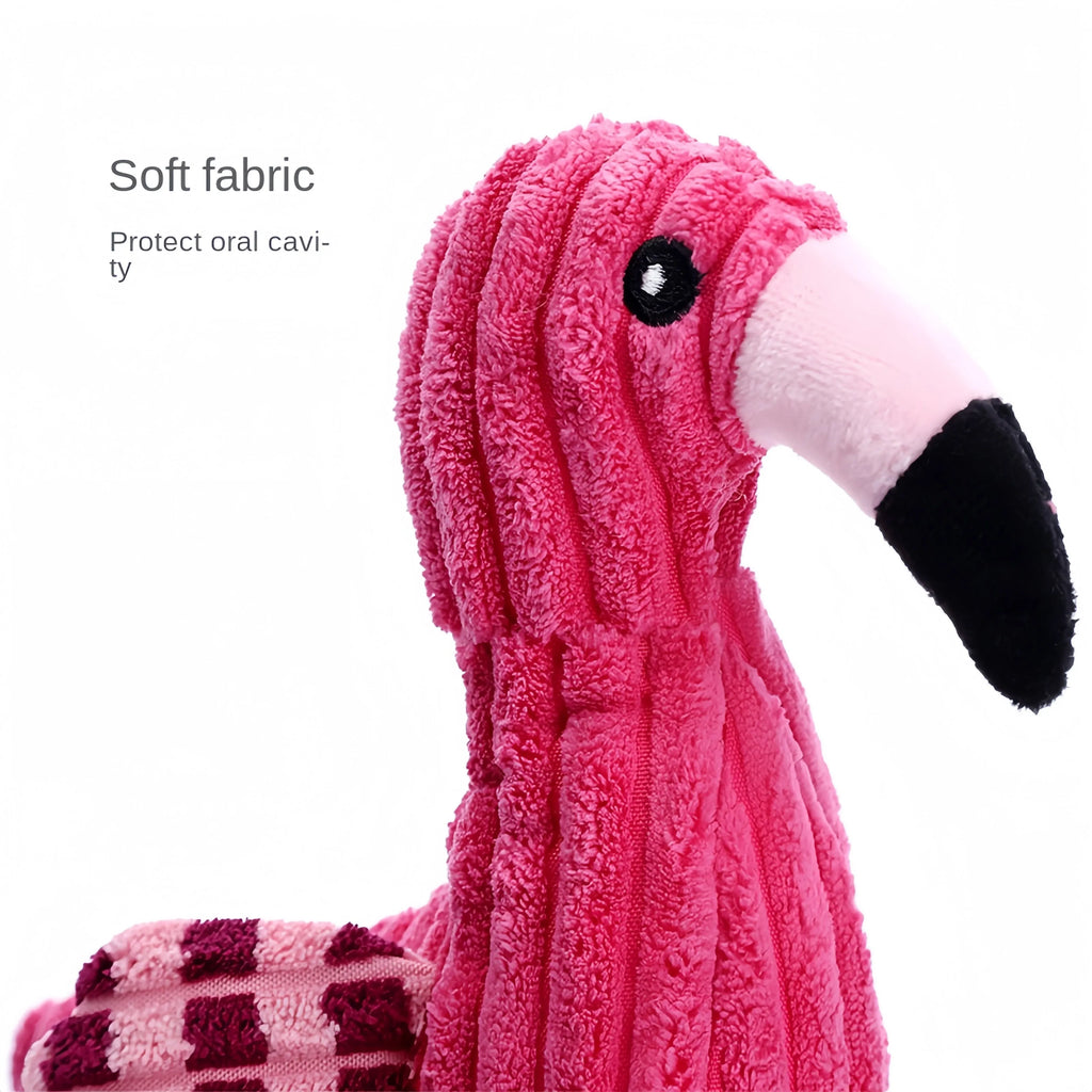 Pink animal-shaped corduroy plush dog toy with squeaker on a white background