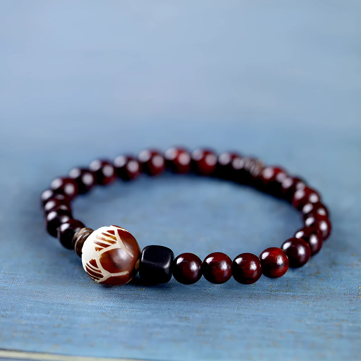 Natural rosewood double-ring bracelet with 10mm floral beads in hand-knitted construction
