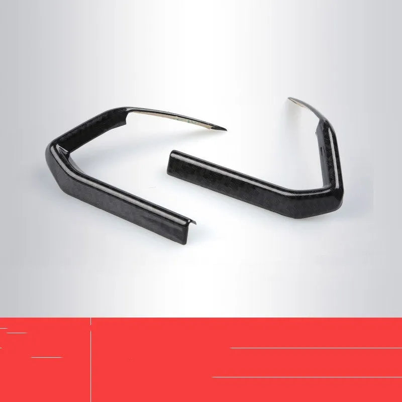 Pair of carbon fibre patterned steering wheel frame overlays for 21 left and right style installation.