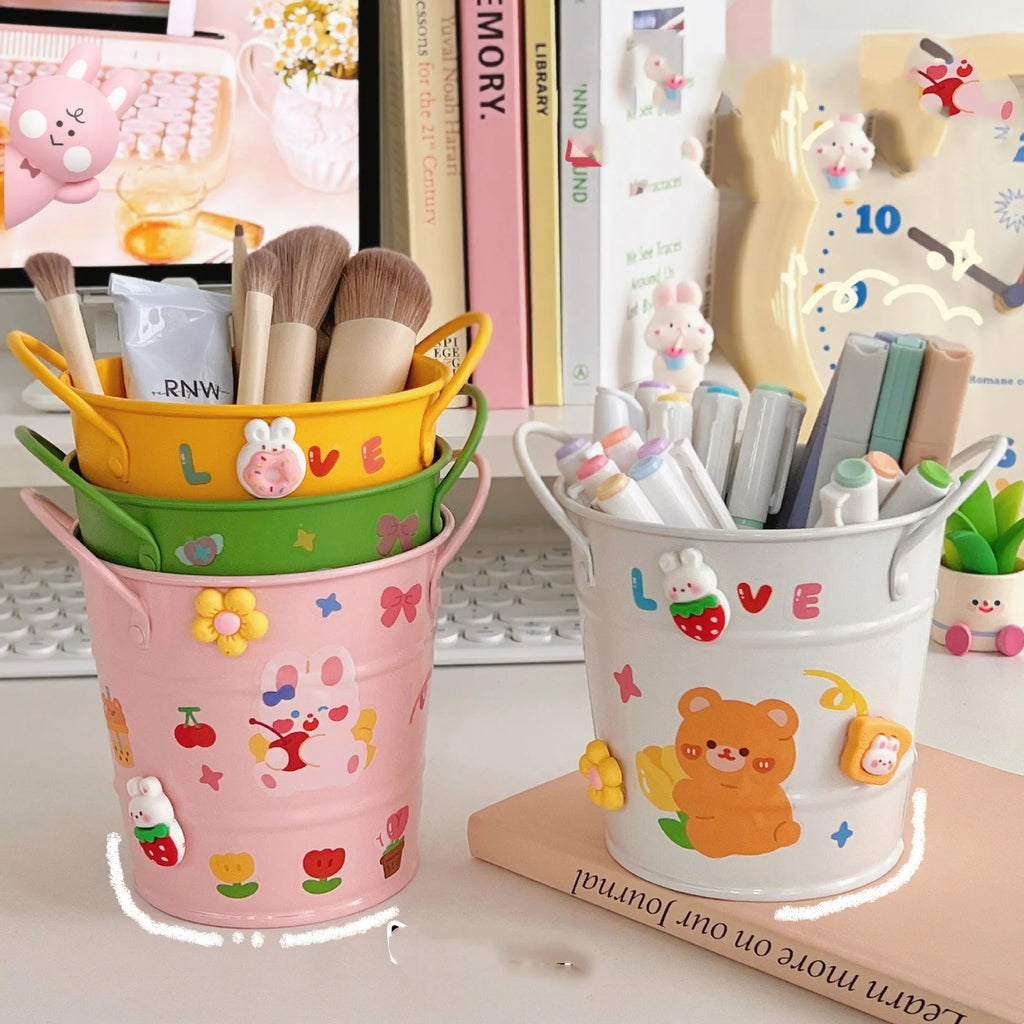 Round metal desktop pen holder in multiple colour options including green, pink, and red