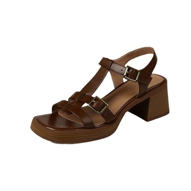 Women's black retro sandals with T-buckle strap, open toe, platform, and chunky heel
