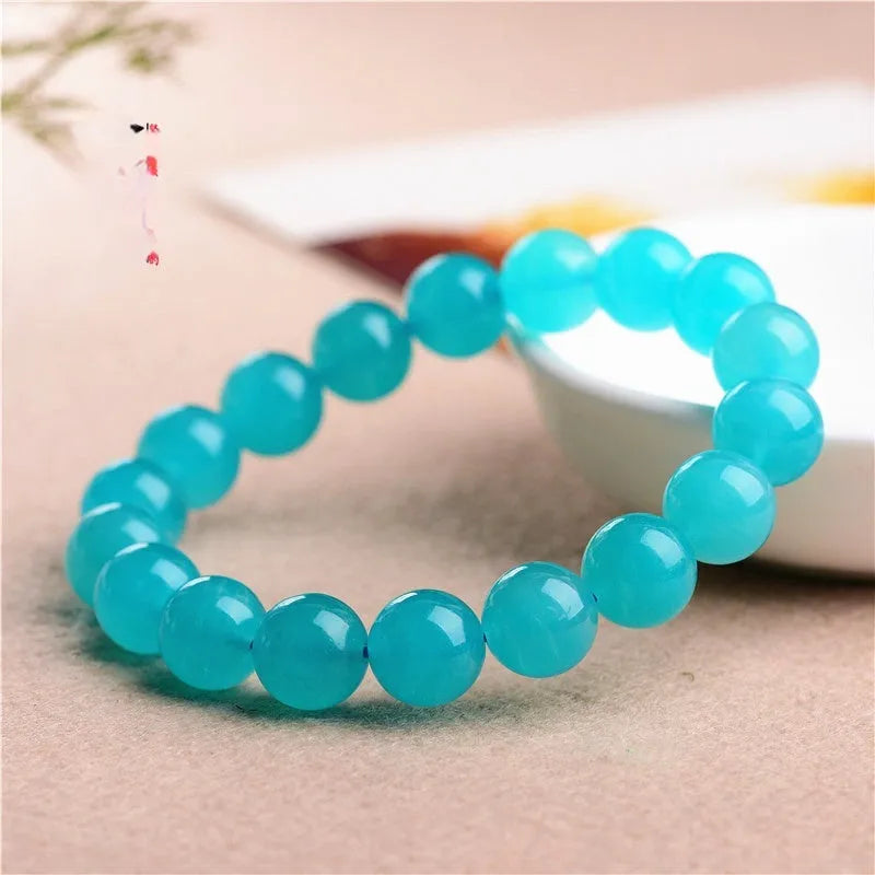 Natural Grade 7A Amazonite scattered beads showing 5A Ice and 7A Ice colour options in various sizes from 6mm to 13mm.