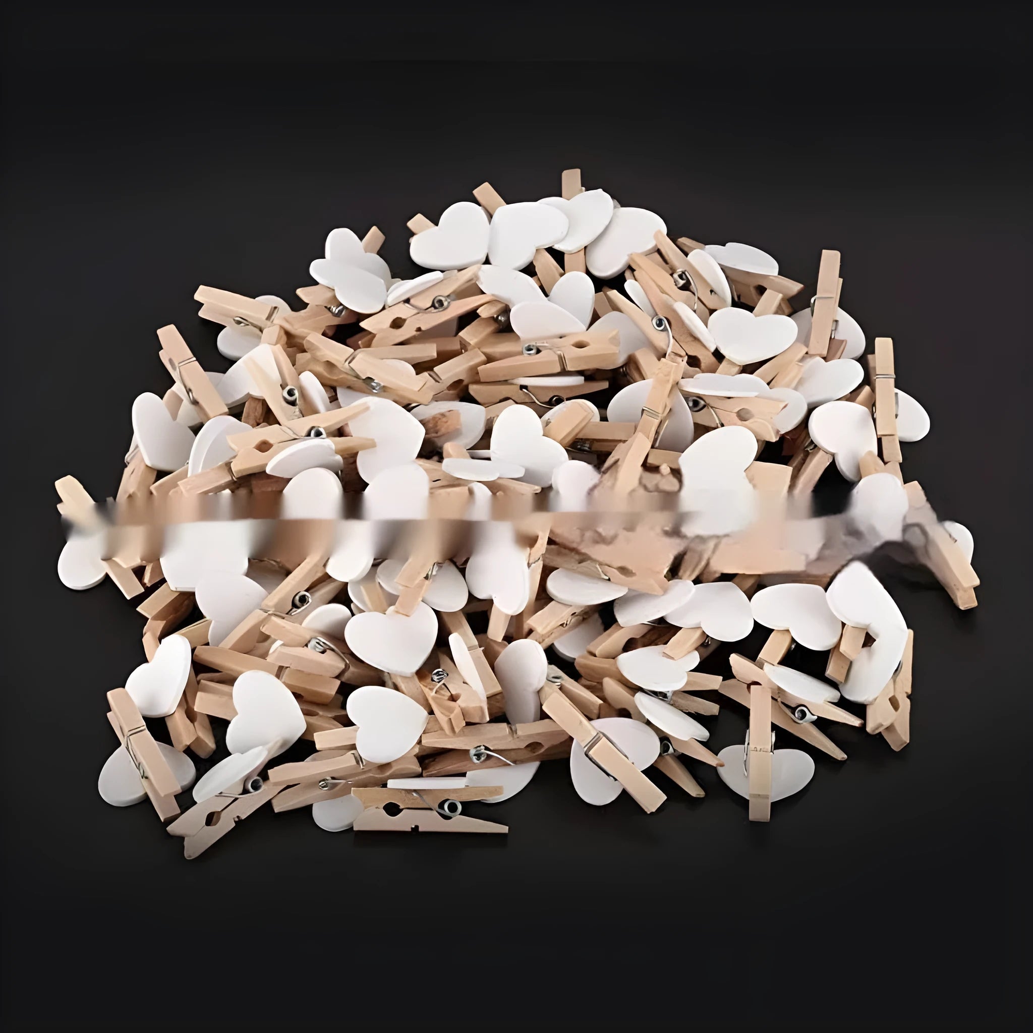 Five small handmade solid wood heart-shaped clips in red, rose red, and white colours.