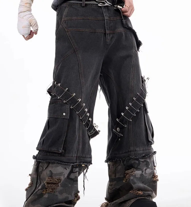 Men's grey camouflage jeans with structural splicing and pin/ribbon details on cotton denim fabric