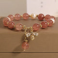 Women's strawberry quartz and freshwater pearl bracelet with zircon details and alloy clasp