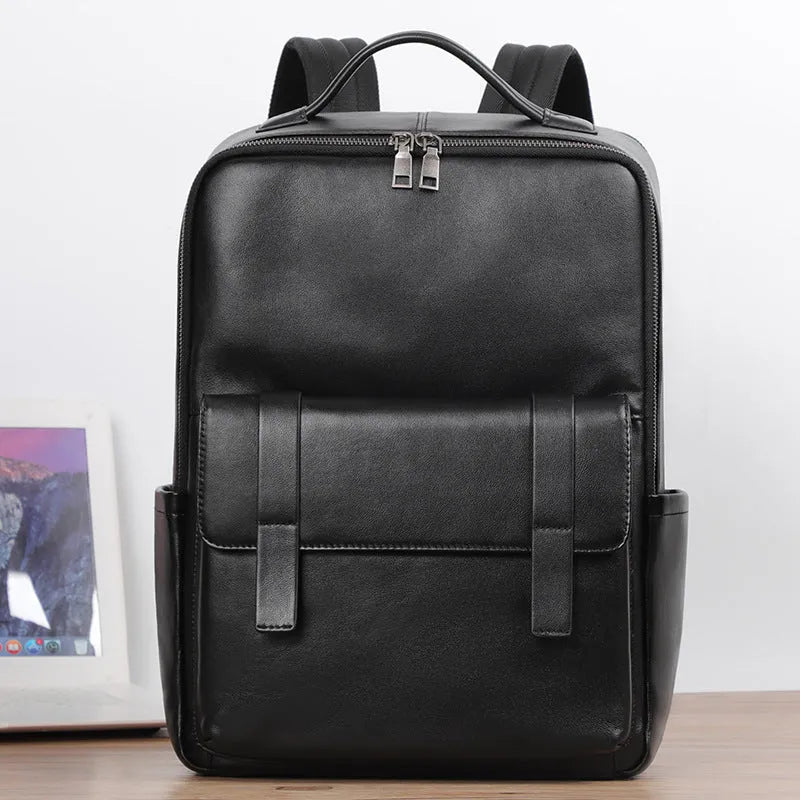 Large black genuine leather men's backpack with woven detail and a curved back panel.