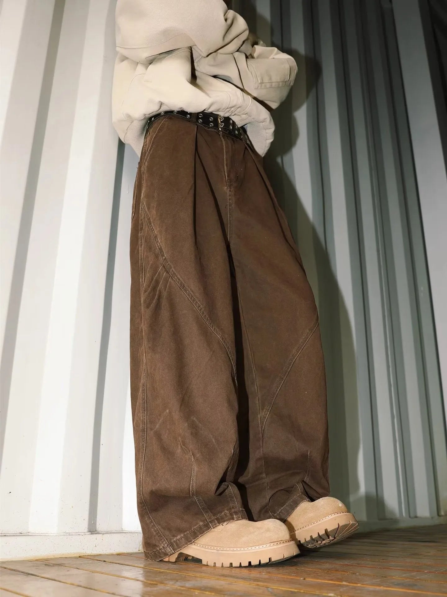 Men's loose straight leg trousers with pleats and stripes in apricot, black, and brown colours