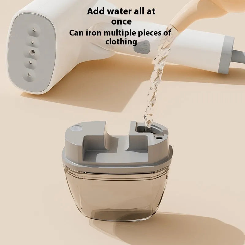 Handheld garment steamer in blue colour showing compact design with water tank