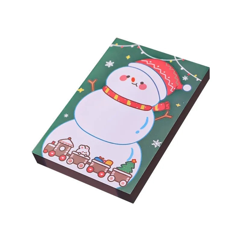 Christmas sticky notes showing eight cartoon designs including Santa Claus, elves, snowmen, and holiday gifts