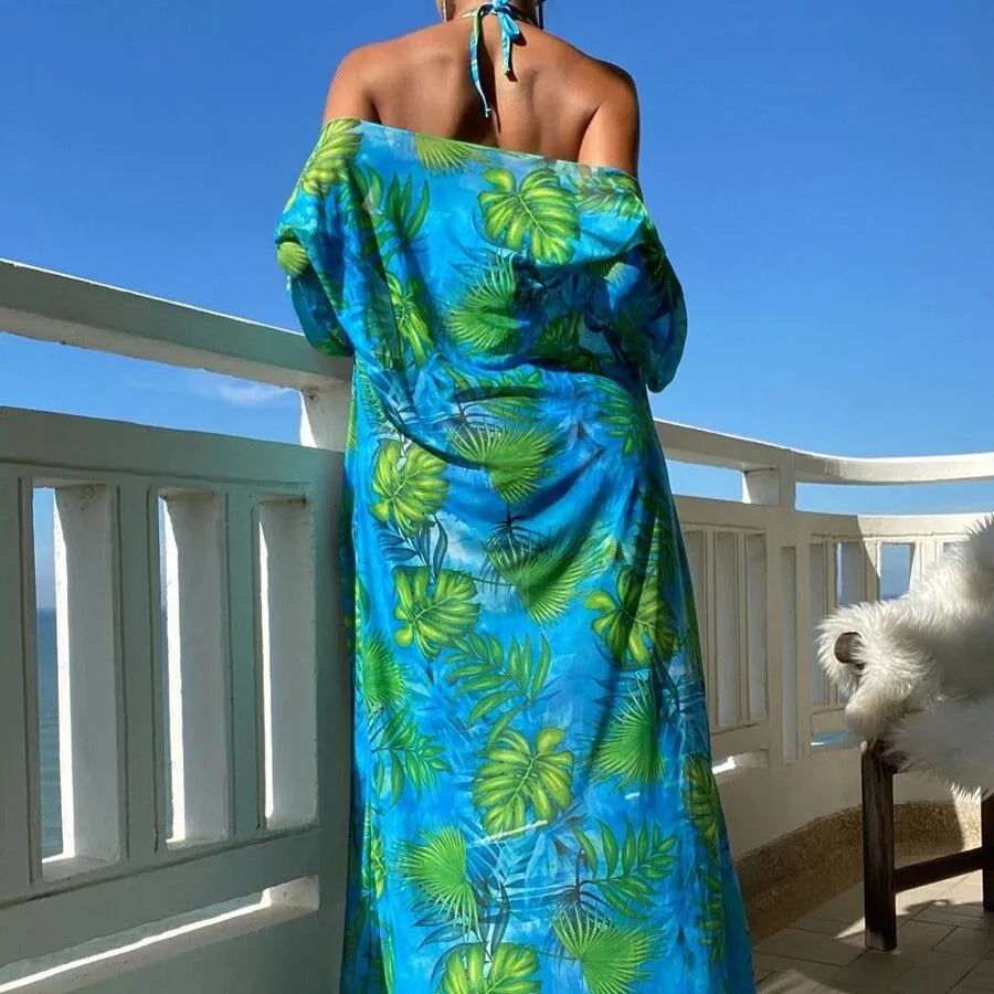 Blue two-piece bikini set with long sleeve blouse, banded briefs, and a robe.