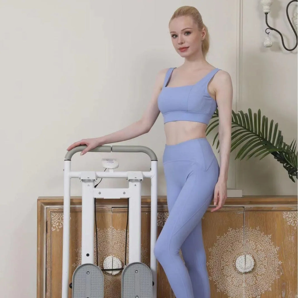 White foldable indoor climbing machine and treadmill for home fitness exercise