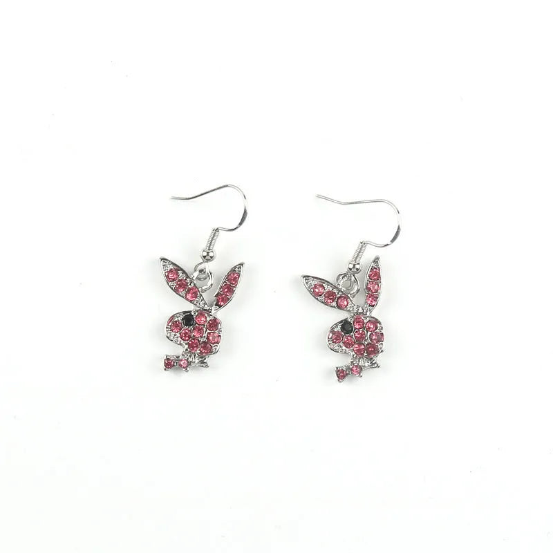 Cute cartoon rabbit stud earrings in silver, pink, or gold colour on alloy posts.