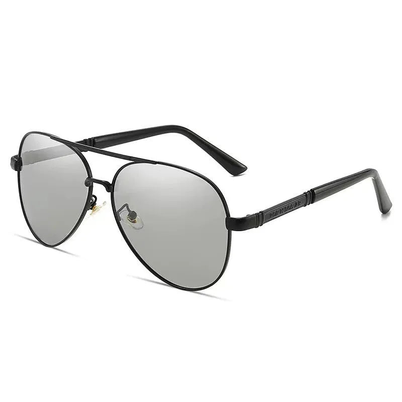 Men's metal sunglasses with polarised lenses and dragon phoenix decoration on the frame.