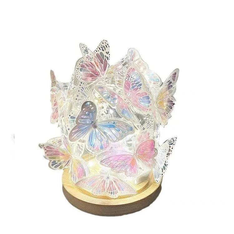 Handmade butterfly night lamp with glass shade and wood base on bedside table