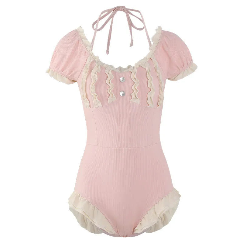 Pink women's conservative one-piece swimsuit with Siamese design