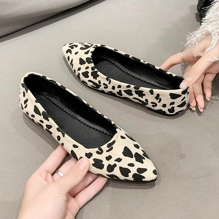 Women's leopard print flat pumps with pointed toe design and low heel