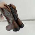 Brown women's embroidered Martin boots with leather lining, low square heel, and waterproof platform sole.