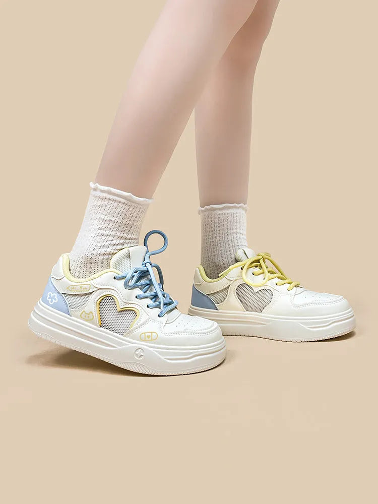 Meow Rabbit Sea Salt Cheese coloured mesh sneakers with lace-up closure and thick rubber sole for children and youth.