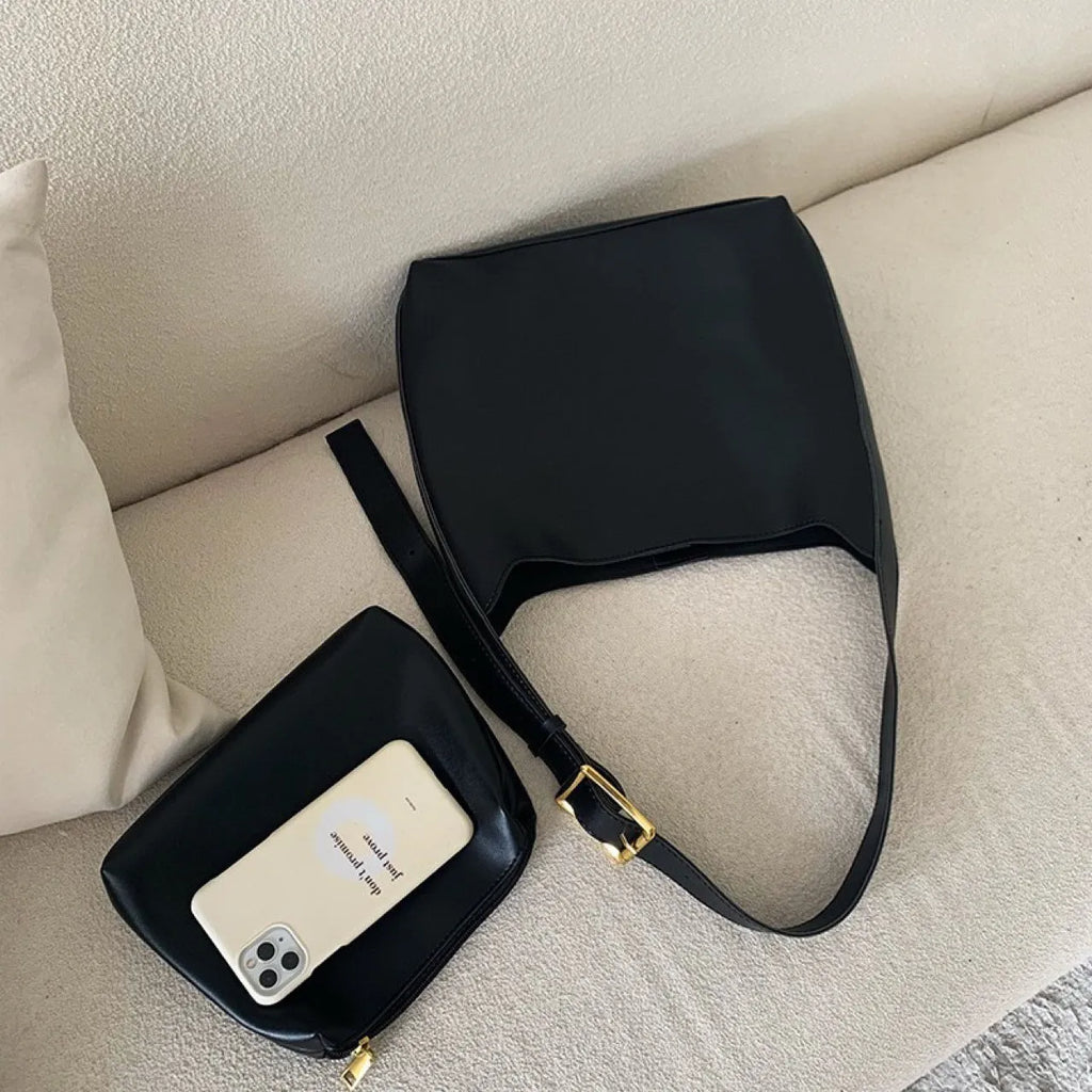 Women's soft PU shoulder bag with swing thread detail in black or brown colour