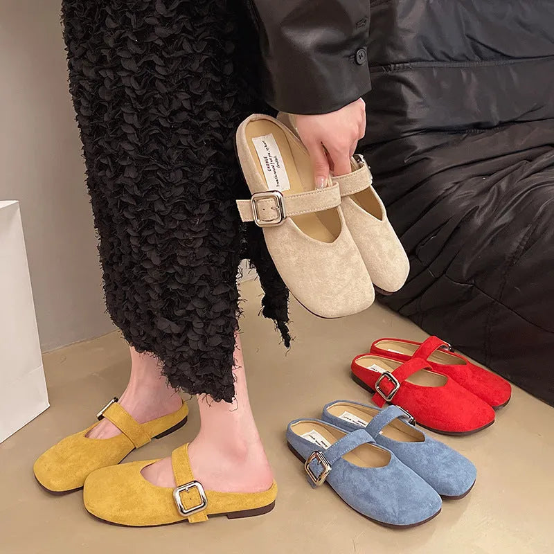 Women's flat closed-toe slippers in apricot with square toe, PU upper, and rubber sole.