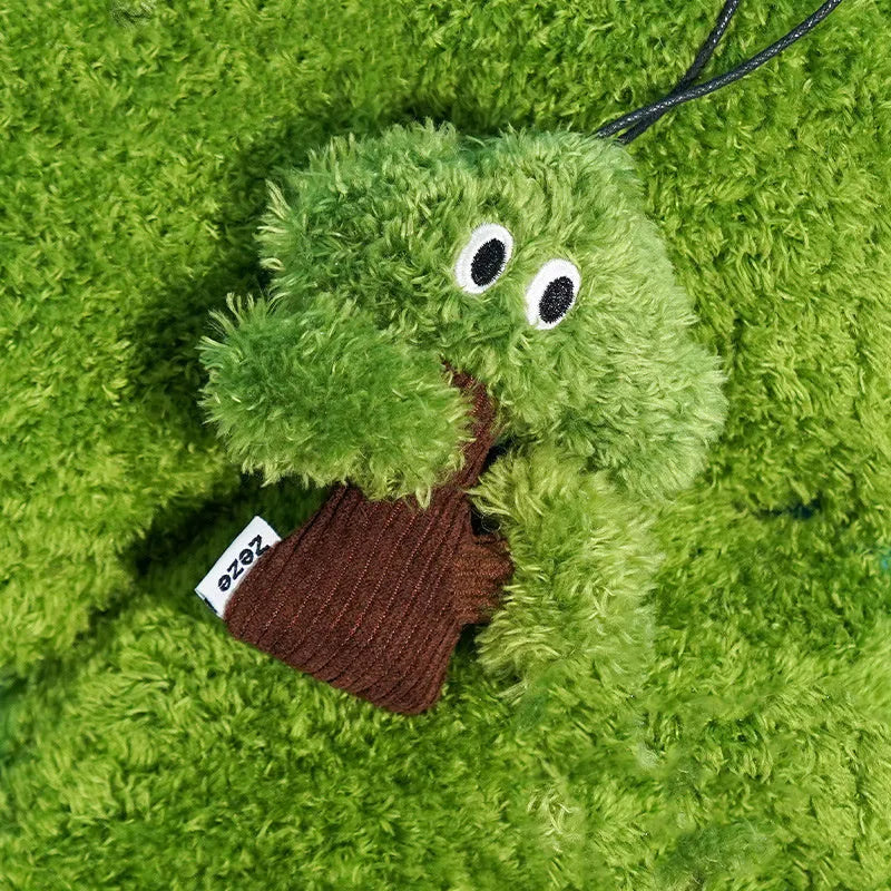 Pine tree-shaped cat chew toy with a dangling pendant, shown in three sizes.
