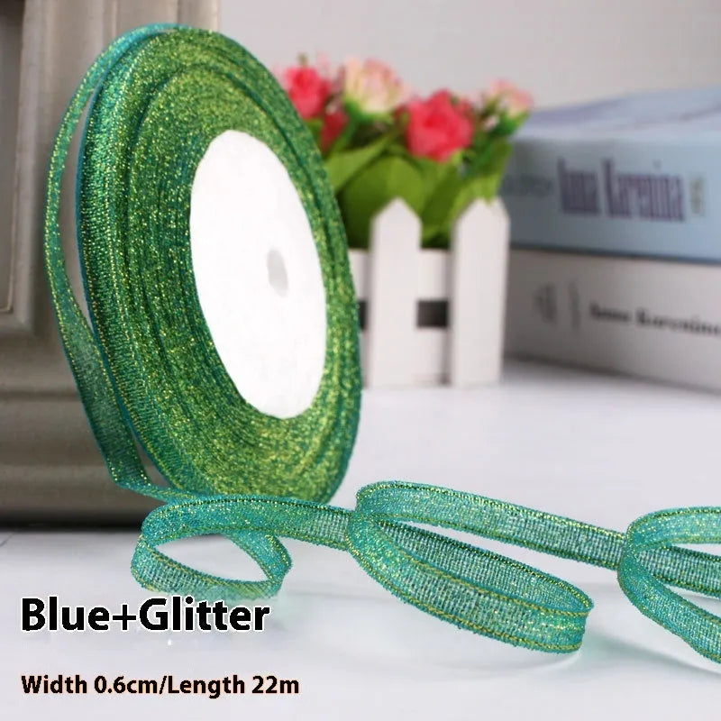 Roll of polyester gift packaging ribbon with 0.6cm width and 22 metre length in various colour options