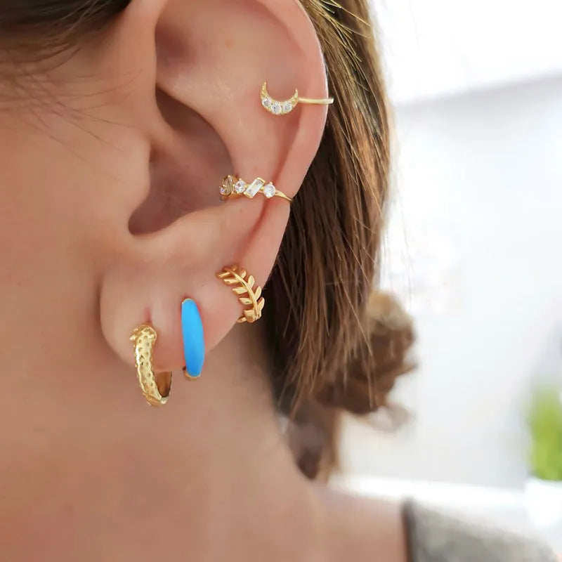 Curved geometric epoxy oval earrings in coloured finish on silver-tone copper post