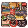 Assortment of large retro beach and surfing themed vinyl stickers on a white background.