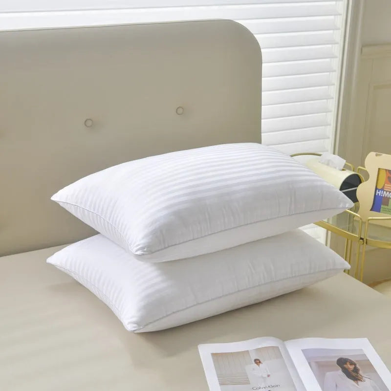 White hotel cotton satin stripe pillow with feather and cotton filling shown in three size options.