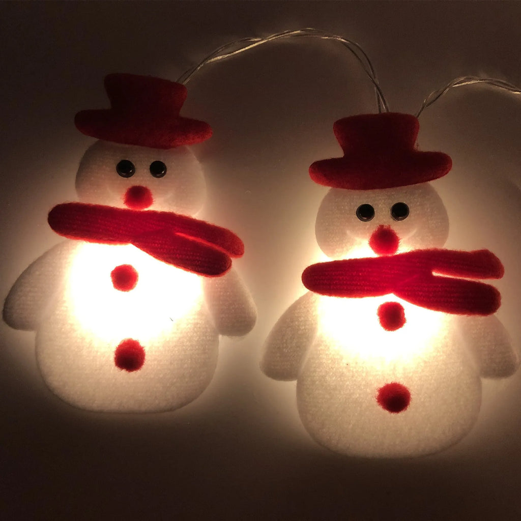 Snowman LED Christmas string lights garland with warm white LEDs on green wire
