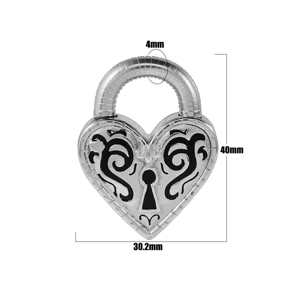 Women's heart-shaped stainless steel earrings in gold or steel colour options for ear piercings