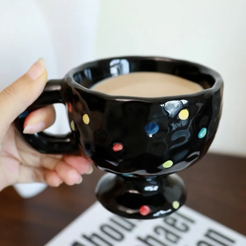 Hand-pinched irregular ceramic mug in solid colour with 250ml capacity