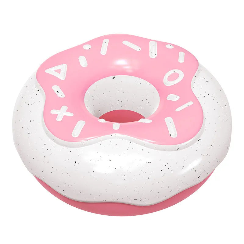 Pink donut-shaped squeaky dog toy with textured surface for dental cleaning