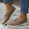 Men's apricot canvas slip-on loafers with a platform sole and round toe on a neutral background.