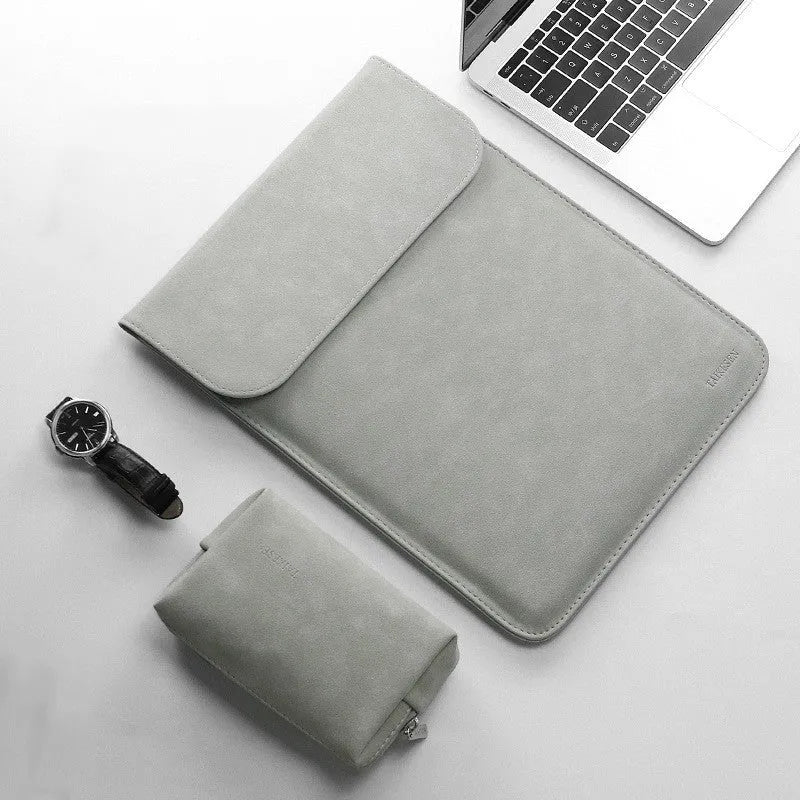 Fleece flanged laptop liner pack in black, green, grey, or pink, 11 to 15.6 inch size options