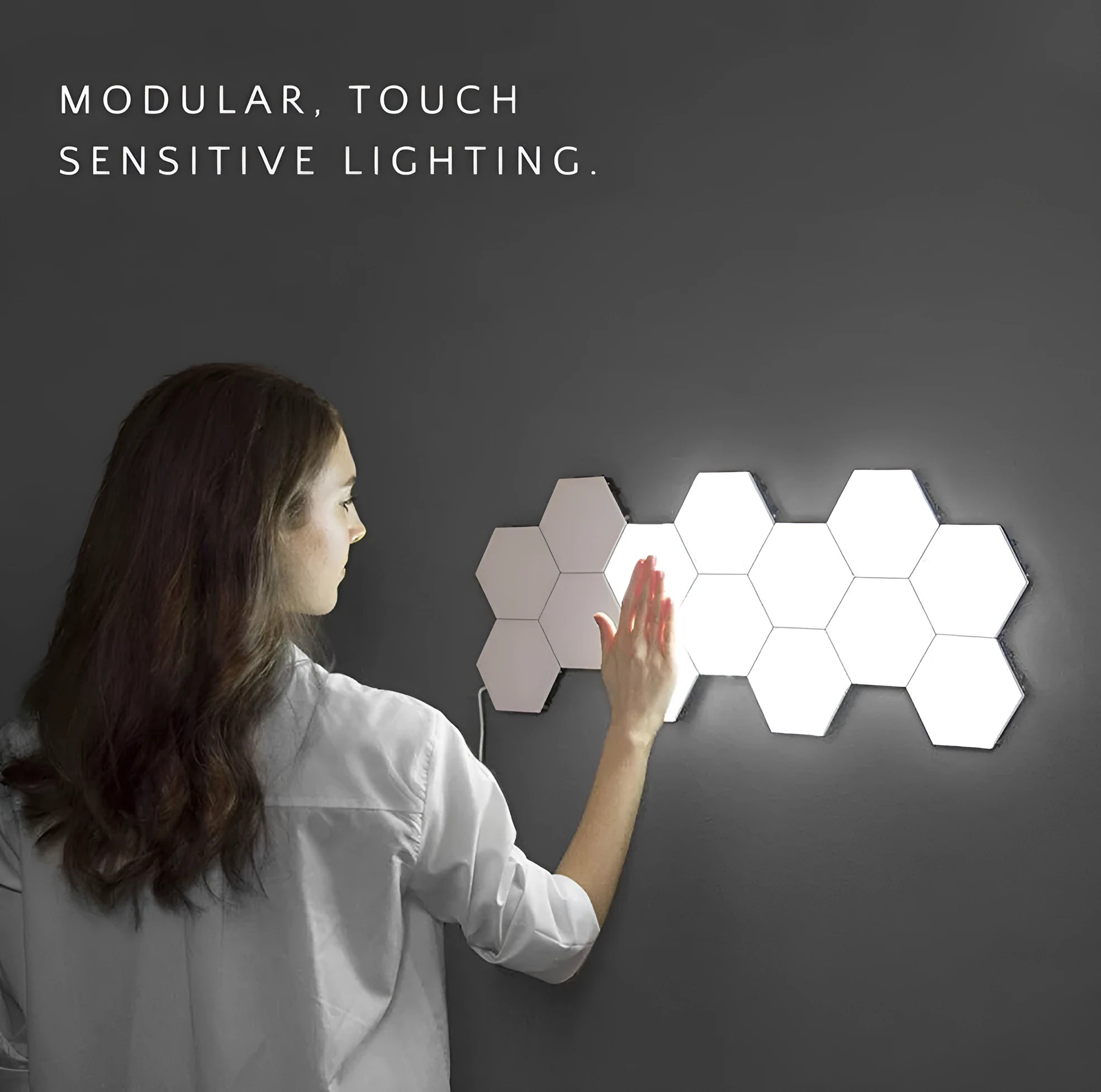 Assembled honeycomb pattern wall lamp with hexagonal white ABS shades and touch control.