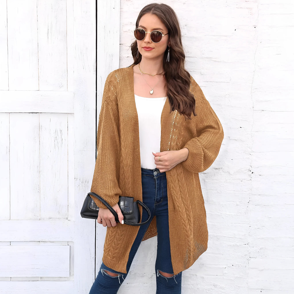 Women's loose acrylic sweater coat in army green, shown on a hanger.