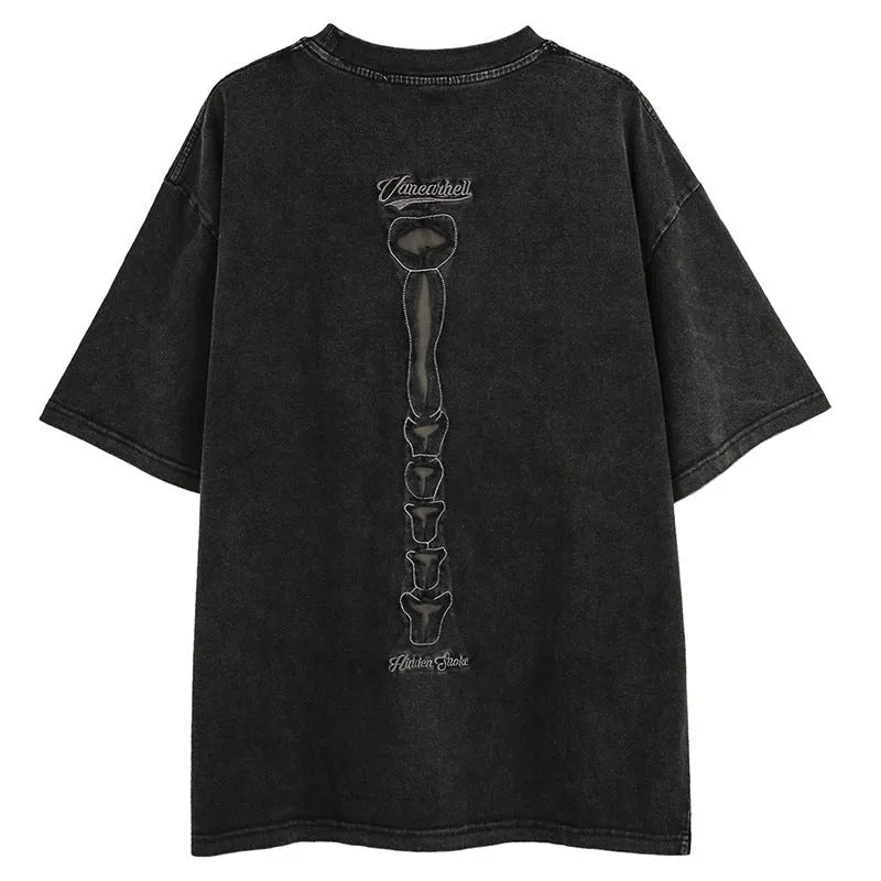 Black cotton t-shirt with skull pattern and drop shoulder sleeves, loose fit streetwear style